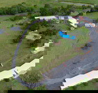 Jacaranda Motor Lodge and Moos Restaurant - Accommodation Main Beach
