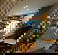 Village Coffee Shop - Accommodation Main Beach