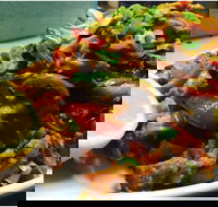 The Dodgy Indian - Accommodation Main Beach