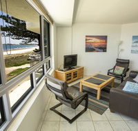 Oceanside Resort - Absolute Beachfront Apartments