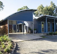Corrugated Cottage - Accommodation Main Beach