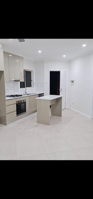 2 Bedroom Modern Home At 61A Glenn St Dean Park NSW - Accommodation Main Beach 4