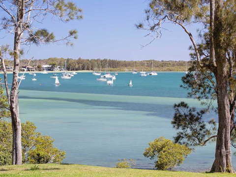 'Corlette Waterfront', 2/44 Danalene Parade - Waterfront Luxury, WIFI, Aircon, Boat Parking - Accommodation Main Beach 0