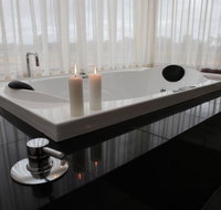 Aurora Cottages Bush Retreat - Accommodation Main Beach