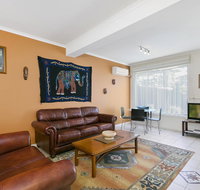 Black Dolphin Waterfront Apartment - Accommodation Main Beach